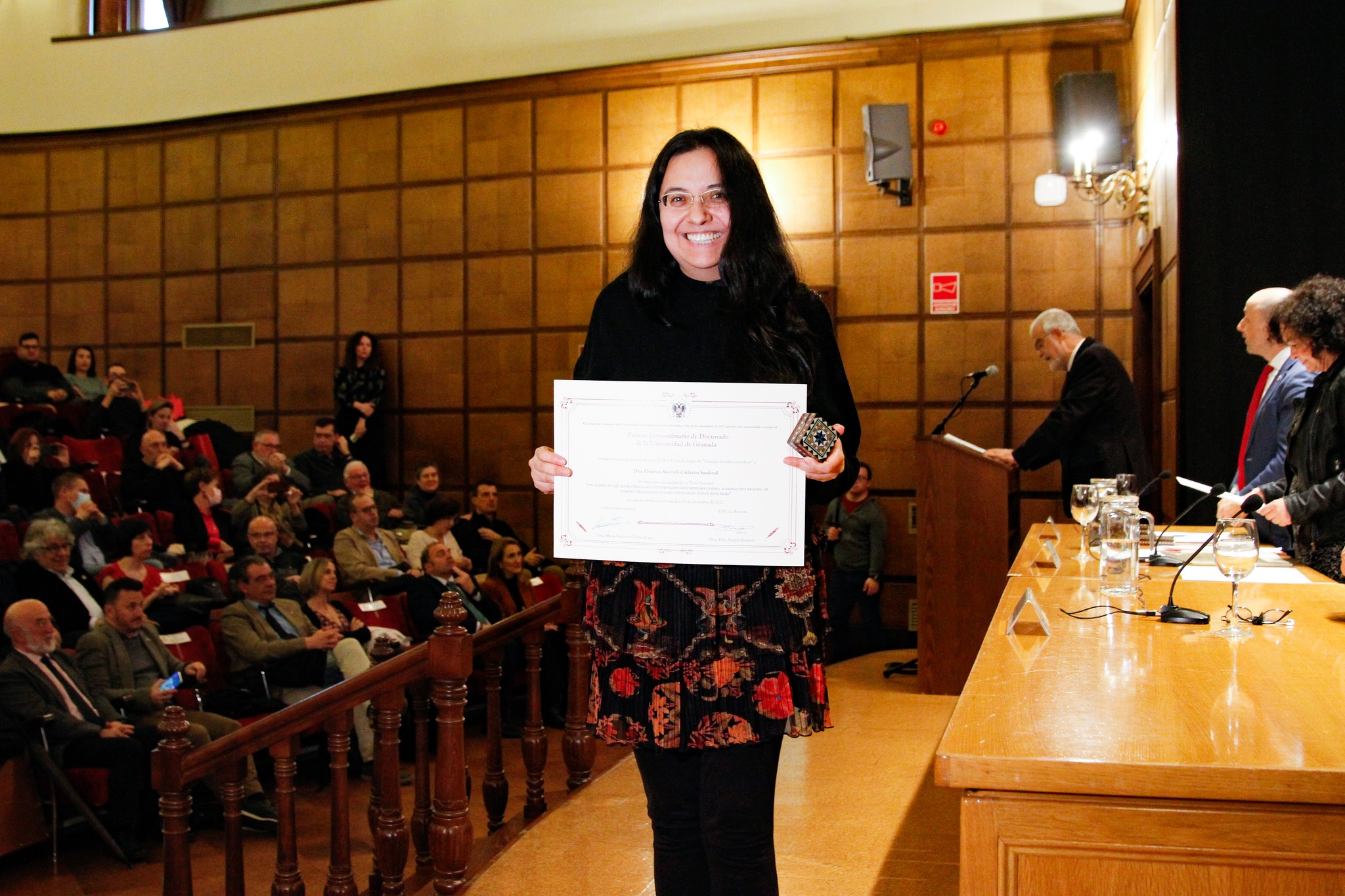 Orianna Calderon showing the diploma